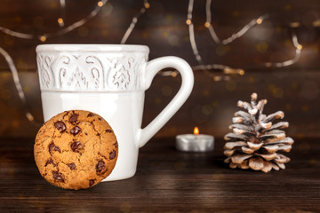 Chocolate chips cookie, hot chocolate, pine cone, copyspace