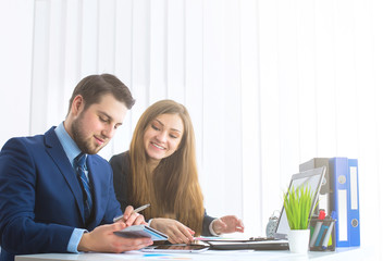 Businessman And Businesswoman Meeting In Modern Office