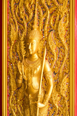 Fototapeta na wymiar Thai golden statue with beautiful traditional texture.