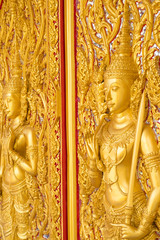 Fototapeta premium Thai golden statue with beautiful traditional texture.