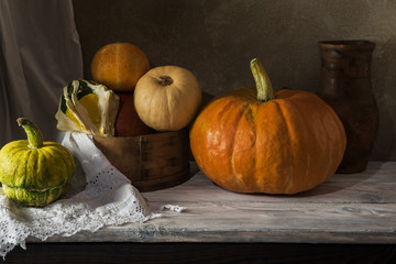 Harvest pumpkin on the table.