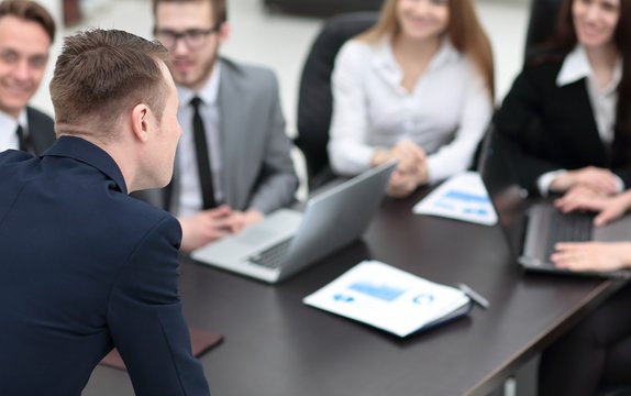 blurred image of business team at a Desk