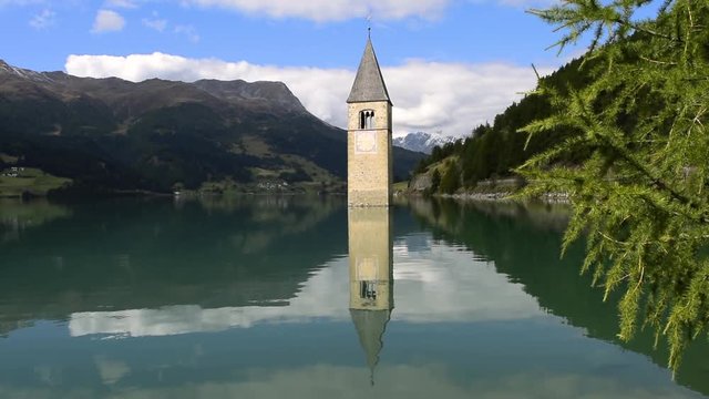 Old bell tower in the Lake Resia - Reschensee, South Tyrol, Italy