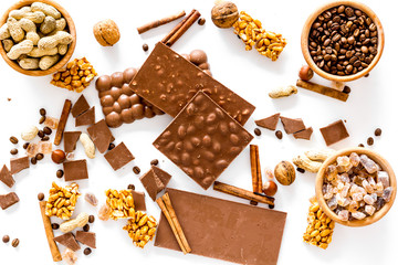 Ingredients for chocolates on white background top view