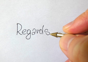 Regards Writing Hand