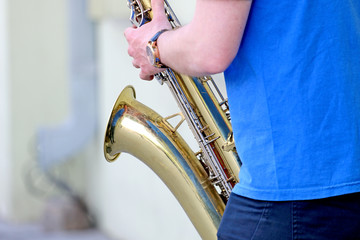 Boy playing the saxophone