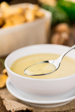 Creamy Chanterelle Soup close-up shot, selective focus