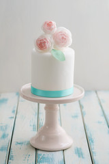 Mini wedding cake with flowers