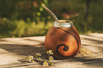Traditional Argentinean yerba mate drink in Calabash with Bombilla