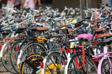 large parking lot with thousands of bicycles