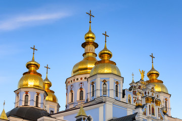 Fototapeta na wymiar Domes of St Michael's Golden Domed Cathedral in Kiev, Ukraine