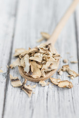 Portion of Dried Mushrooms on wooden background, selective focus