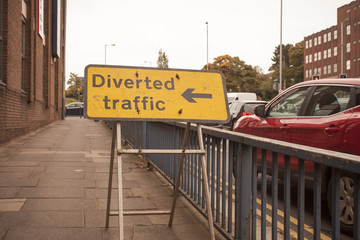 Diverted Traffic traffic sign on white street
