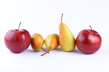 Yellow pears, red and green apples on a white background isolated for designer