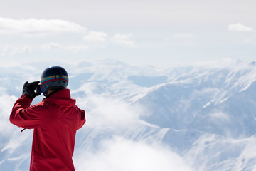 Snowboarder makes photo on camera