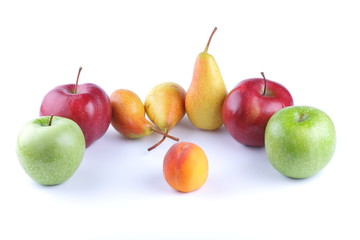Yellow pears, peach, red and green apples on a white background isolated for designer