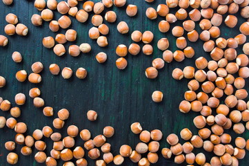 Bunch of hazelnuts on a wooden board