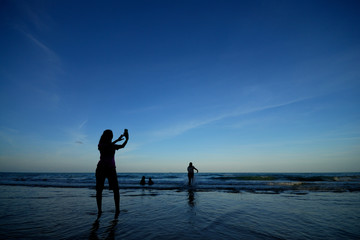Fototapeta premium woman selfie at the sea