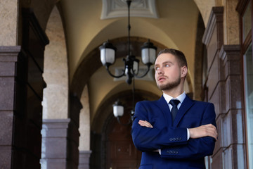 Handsome man in suit outdoors