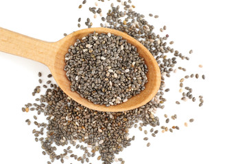Wooden spoon with chia seeds on white background