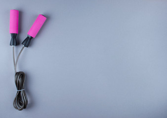 Flat lay shot of sneakers, earphones, phone.