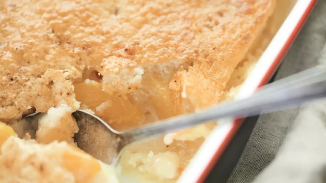 Freshly baked peach cobbler made with organic peaches