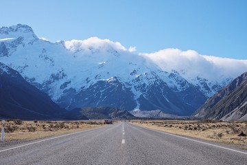 Road leading to the mountains and adventure