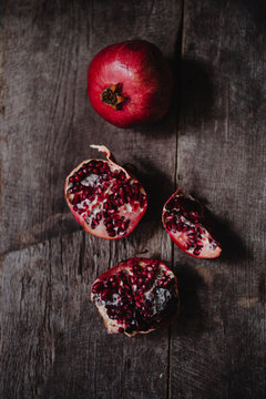 Pomegranates on a wooden background