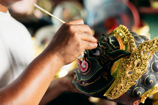 Artisan painting 'Hua Khon' traditional mask for Thai performing arts