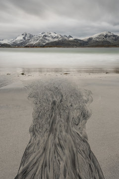 Abstract textures in the sand at Ramberg beach, Norway