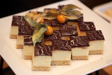 dessert detail - chocolate  cheese cake with exotic fruit