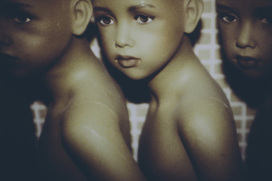 Row of mannequin children