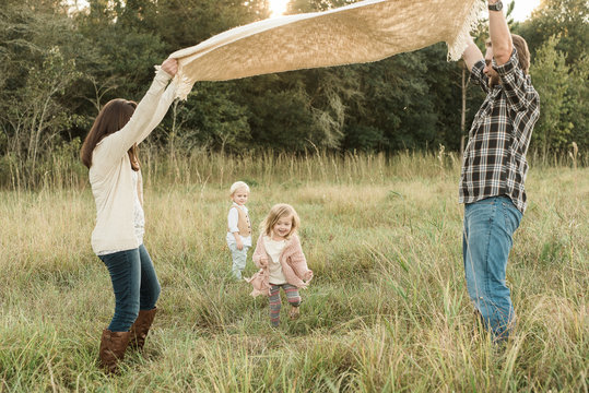 Parents Playing With Their Children