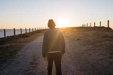 young male at coastal view point in california