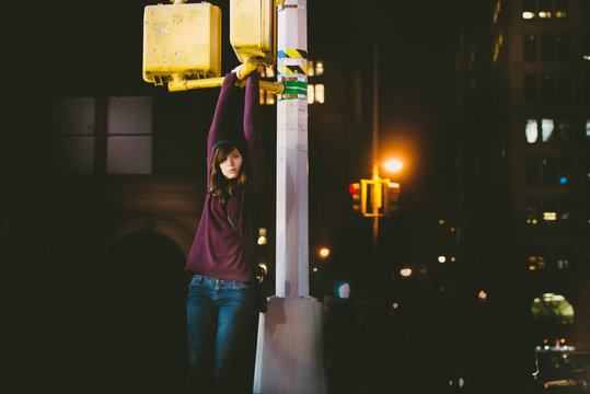 Young woman hanging out in the city at night