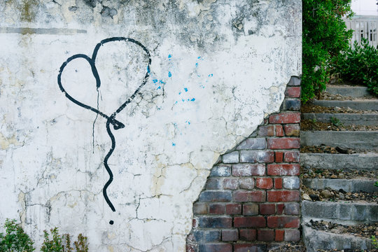 Spray painted heart on a wall