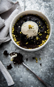 Brownie with ice cream and pistachios