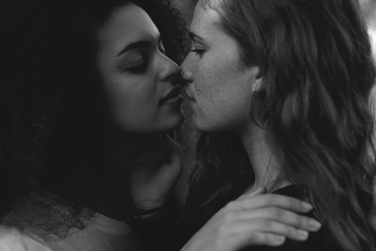 Close-up of two lesbians kissing