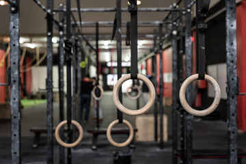gymnastic rings in a crossfit gym