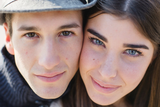 Cheek to cheek of two beautiful young