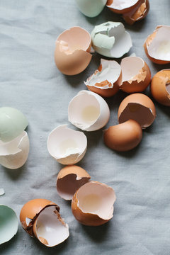 Cracked eggs on table