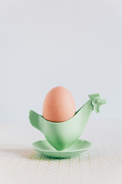 Vintage eggcup in form of chicken and egg