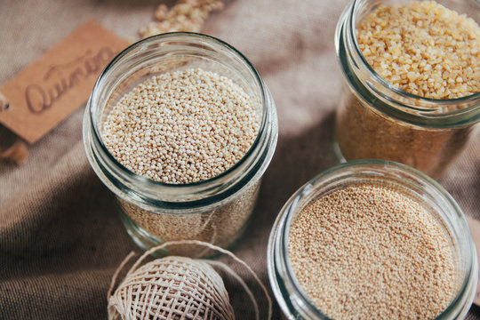 Quinoa, amaranth, bulgur and buckwheat in jars