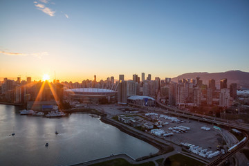 Aerial view of Downtown Vancouver City, BC, Canada, during sunset.