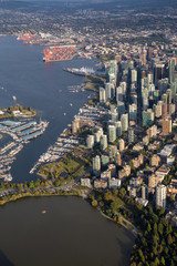 Obraz premium Downtown Vancouver City , Stanley Park and Coal Harbour viewed from an aerial perspective. Picture taken in British Columbia, Canada, during a sunny day.