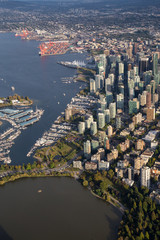 Downtown Vancouver City , Stanley Park and Coal Harbour viewed from an aerial perspective. Picture taken in British Columbia, Canada, during a sunny day.
