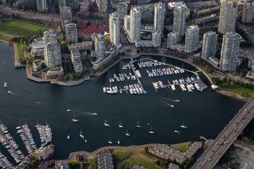False Creek, Cambie Bridge, Marina, and Residential Buildings viewed from an aerial perspective in Downtown Vancouver, British Columbia, Canada.