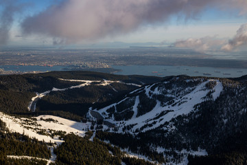 Naklejka premium Cypress Mountain from an aerial perspective with Vancouver City, BC, Canada, in the background.