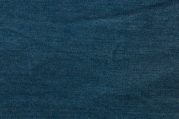 Blue background, denim jeans background. Jeans texture, fabric.