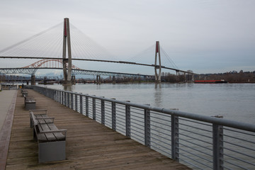 Fototapeta premium Westminster Pier Park. Picture taken during a cloudy evening in Greater Vancouver, British Columbia, Canada.